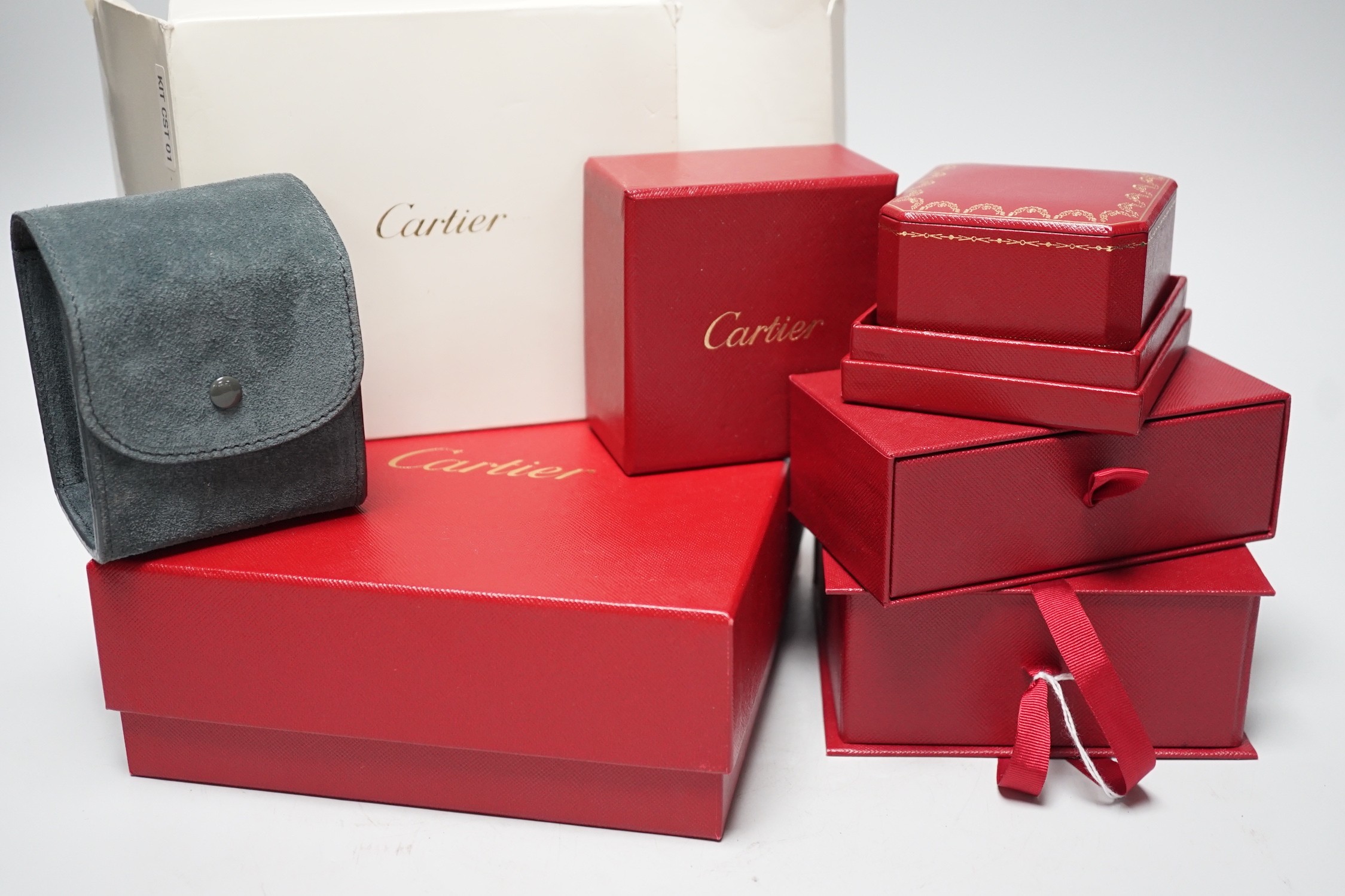 Six various Cartier boxes and Cartier pouches